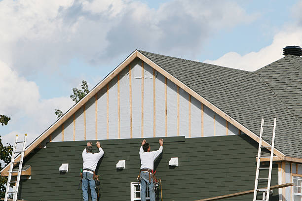 Professional Emergency Siding Repair technician working in Hudson, FL